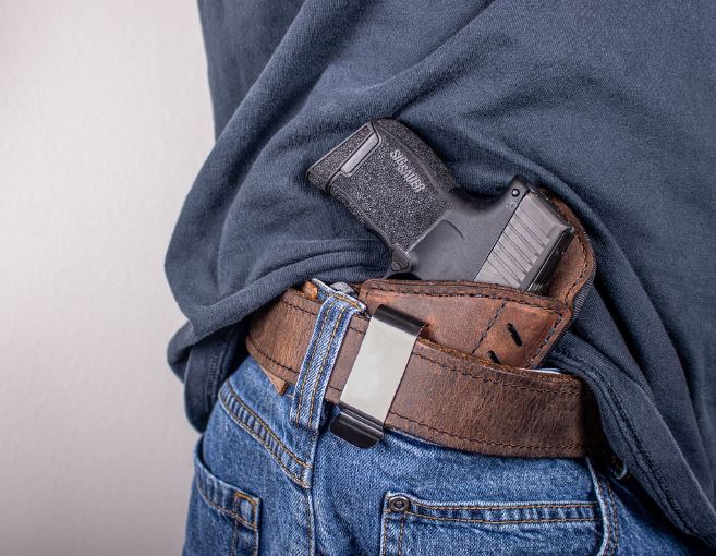 10 Symbolic Meanings of Dreaming of Shooting Someone with a Gun